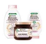 Trzy produkty Garnier Botanic Therapy Oat Delicacy (szampon, odżywka, maska), na białym tle