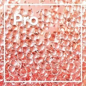 Lśniące, półprzezroczyste czerwono-różowe kule w skupisku, w białej ramce, napis „Pro”