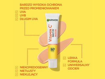 Tubka Garnier Vitamin C Daily UV Glow SPF 50+ z trzema brzoskwiniowymi smugami, na żółtym tle