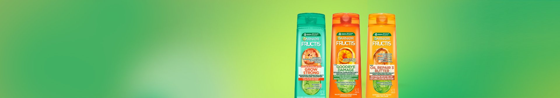 Trzy kolorowe butelki szamponu Garnier Fructis w rzędzie, na jasnozielonym gradiencie