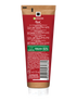 Tubka kremu do rąk Garnier Hand Repair z czerwono-brązową etykietą, na białym tle