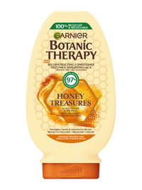 Kremowa butelka odżywki Garnier Botanic Therapy z motywem plastra miodu
