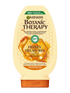 Kremowa butelka odżywki Garnier Botanic Therapy z motywem plastra miodu