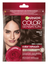 Opakowanie Garnier Color Sensation Color Retouch z modelką o brązowych włosach i różą