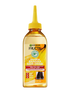 Butelka Garnier Fructis z bursztynowym płynem i żółtym dziubkiem, napis „97% naturalnych składników”