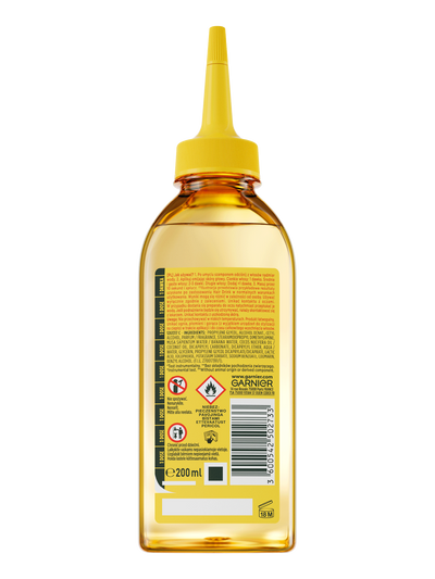 Przezroczysta butelka Garnier Fructis ze złocistym płynem i żółtym dziubkiem, tylna etykieta