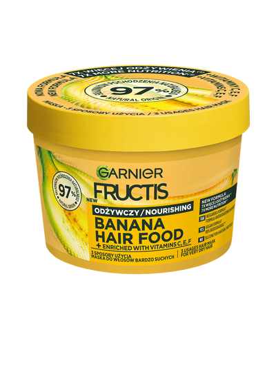Żółty słoik maski Garnier Fructis Banana Hair Food do odżywiania, na białym tle