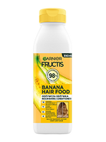 Biała butelka Garnier Fructis Banana Hair Food z żółtym kapslem i motywem banana