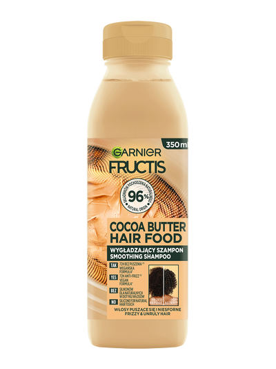 Jasnobrązowa butelka szamponu Garnier Fructis Cocoa Butter Hair Food 350 ml, na białym tle