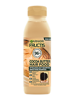 Jasnobrązowa butelka szamponu Garnier Fructis Cocoa Butter Hair Food 350 ml, na białym tle