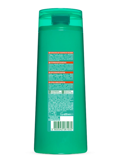 Turkusowa butelka szamponu Garnier, tylna etykieta z opisem produktu, na białym tle
