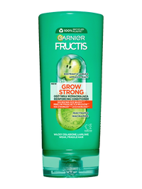 Zielona butelka odżywki Garnier Fructis z etykietą, na ciemnozielonym tle, „100% recyklingu”