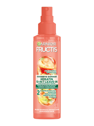 Łososiowo-różowa butelka ze sprayem Garnier Fructis Goodbye Damage Keratin, na białym tle