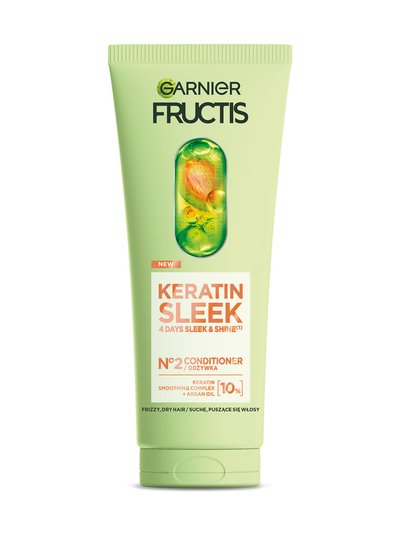 Jasnozielona tubka odżywki Garnier Fructis z grafiką kapsułki z owocem i pęcherzykami