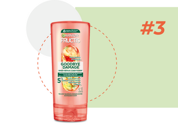 Różowo-pomarańczowa butelka odżywki Garnier Fructis na biało-zielonym tle z okrągłymi ikonami