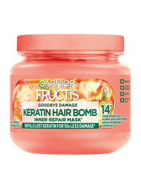 Koralowy słoik maski Garnier Fructis Keratin Hair Bomb z motywem owoców