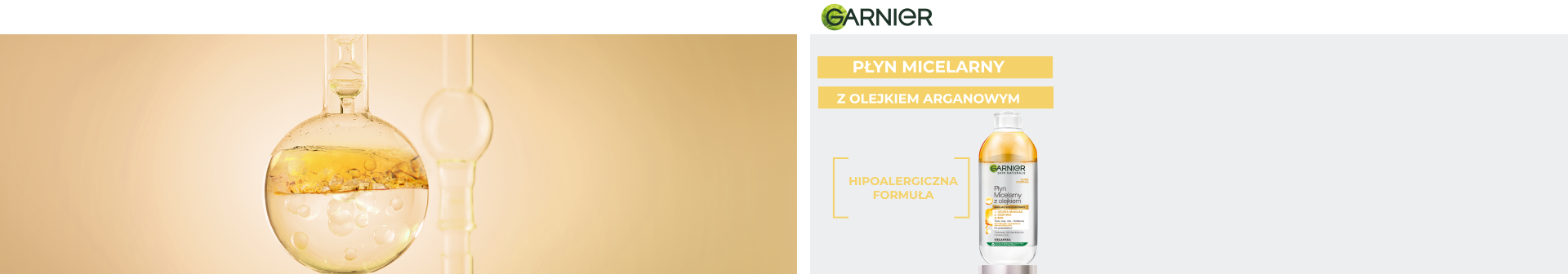 Szklana kolba ze złotym olejkiem oddzielającym się od płynu, obok butelka Garnier, na złotym tle