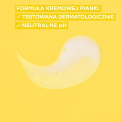 Biały, żółtawy wir pianki na żółtym tle, opis „Formuła kremowej pianki – testowana dermatologicznie”