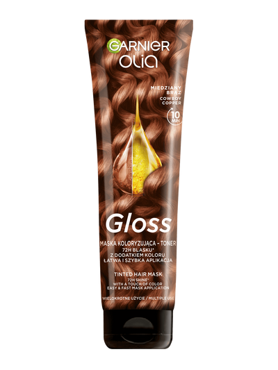 Tubka Garnier Olia Gloss z falowanymi, miedziano-brązowymi włosami i kroplą olejku, na ciemnym tle