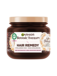 Ciemnobrązowy słoik maski Garnier Botanic Therapy Oat Delicacy ze złotą pokrywką, motyw owsa