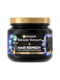 Czarny słoik maski Garnier Botanic Therapy ze złotą pokrywką, niebieskie kwiaty, węgiel i krople olejku