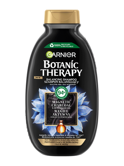 Czarna butelka szamponu Garnier Botanic Therapy z niebieskimi kwiatami i teksturą węgla