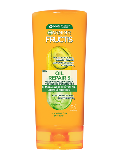 Pomarańczowa butelka odżywki Garnier Fructis do suchych włosów z etykietami ze składem