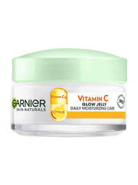Biały słoik nawilżającego żelu Garnier Vitamin C Glow Jelly z jasnozieloną pokrywką