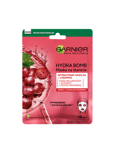Różowo-zielone opakowanie maski Garnier z winogronami, rozpryskami płynu i pipetą