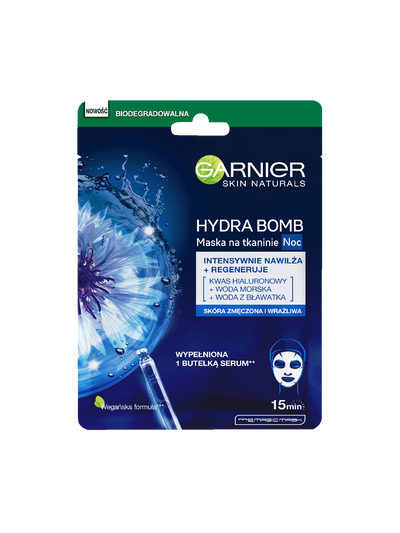Reklama maski Garnier Hydra Bomb na noc na niebieskim tle z kwiatem, rozpryskiem wody i pipetą