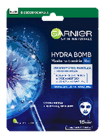 Reklama maski Garnier Hydra Bomb na noc na niebieskim tle z kwiatem, rozpryskiem wody i pipetą