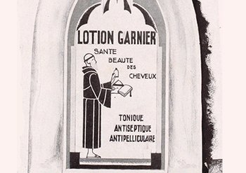 Mnich z buteleczką i książką w łukowej, oprawionej reklamie, napis „Lotion Garnier”
